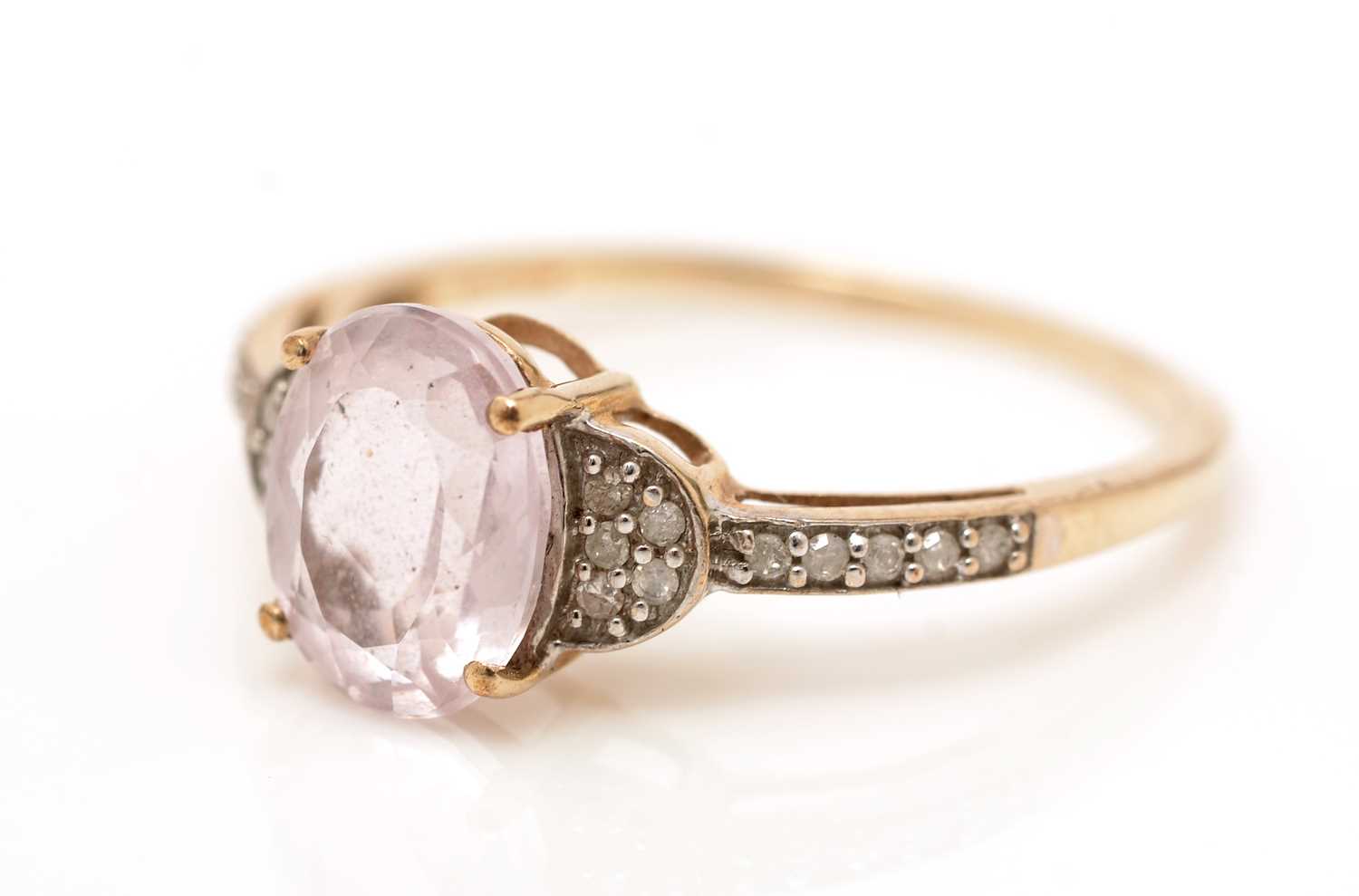 A kunzite and diamond ring,