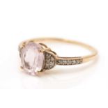 A kunzite and diamond ring,