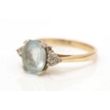 An aquamarine and diamond ring,