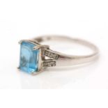 A topaz and diamond ring,