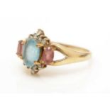 A topaz, pink-stone and diamond ring,