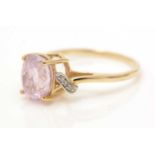 A kunzite and diamond ring,