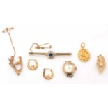 A selection of gold jewellery.
