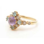 An amethyst, topaz and diamond ring,