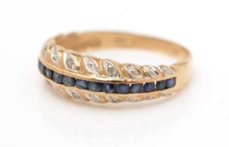 A sapphire and diamond half hoop ring,