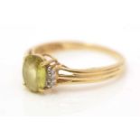 A yellow zircon and diamond ring,