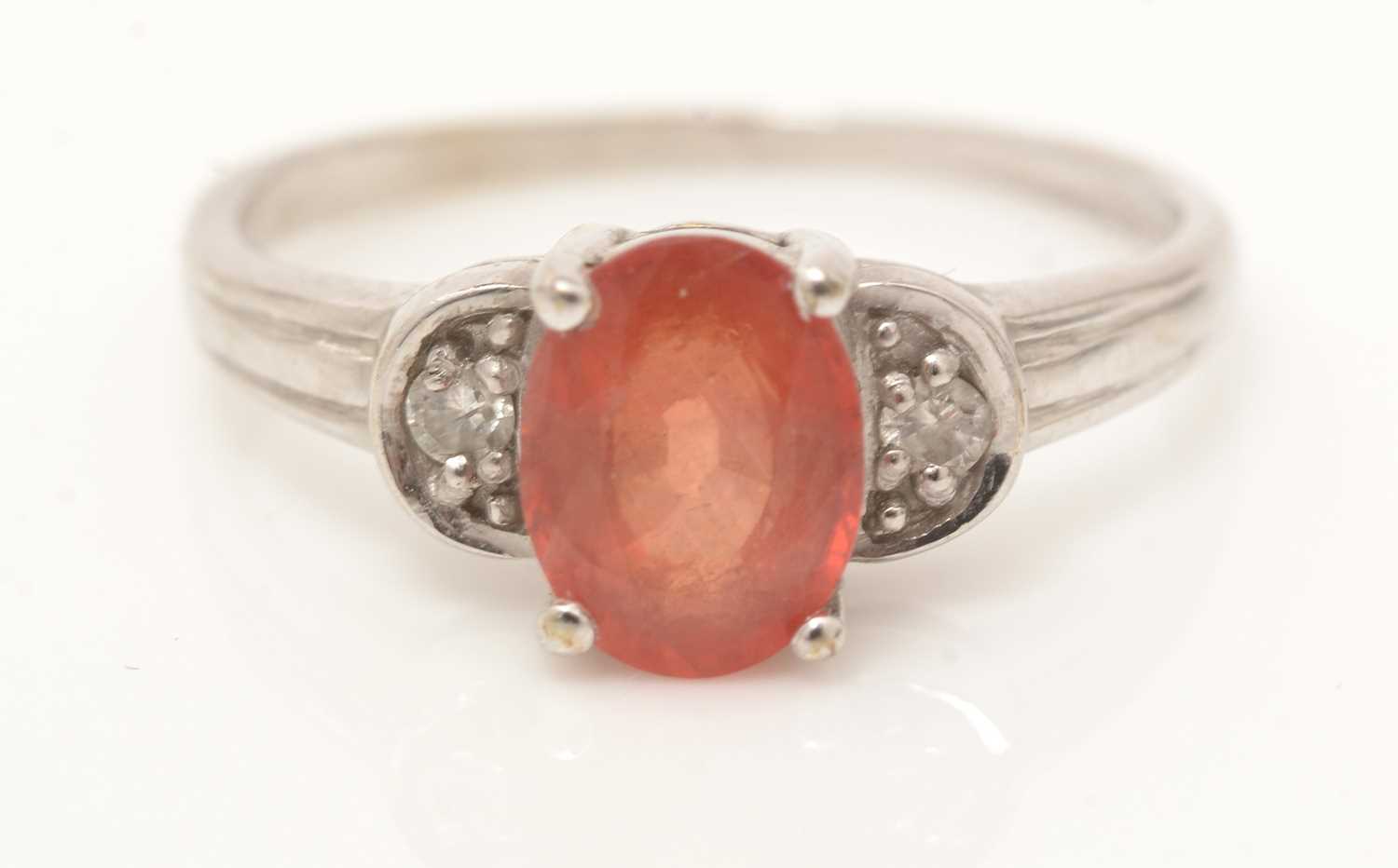 An orange sapphire and diamond ring, - Image 2 of 3
