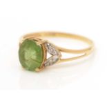 A peridot and diamond ring,