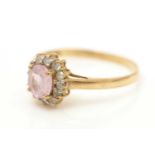 A pink sapphire and diamond ring,