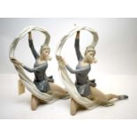 A pair of Nao figures of ballerinas.