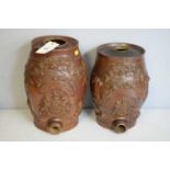 Two salt glaze stoneware spirit barrels.