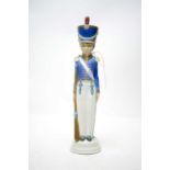 A Lladro figure of a toy soldier boy.