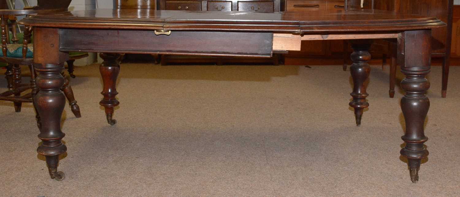 A substantial Victorian mahogany draw leaf dining table. - Image 2 of 14