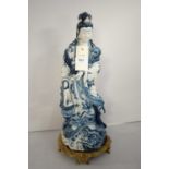 A Chinese blue and white ceramic figure of Guanyin
