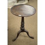 A Victorian style mahogany wine table.