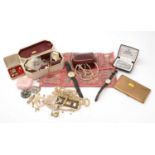 A quantity of costume jewellery, watches and a cigarette case.