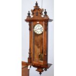 A walnut Vienna-style clock.