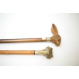 A novelty walking cane with hare head handle; and another.