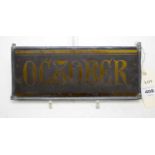 An ‘October’ glass plaque or panel, in lead frame.