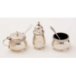 A three piece silver condiment set, with plated spoons