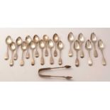 Silver teaspoons and tongs