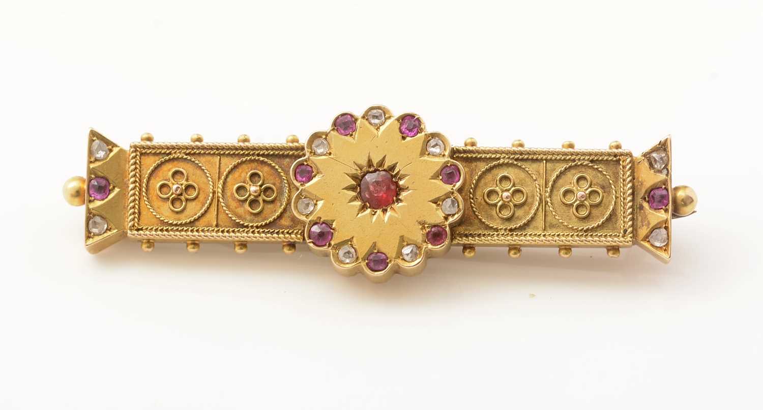 A Victorian Etruscan revival ruby and diamond set gold brooch, - Image 2 of 2