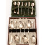 Two cased sets of silver spoons