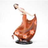 A Continental Art Deco porcelain figure of a dancer.