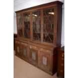 A late Victorian carved mahogany library bookcase.