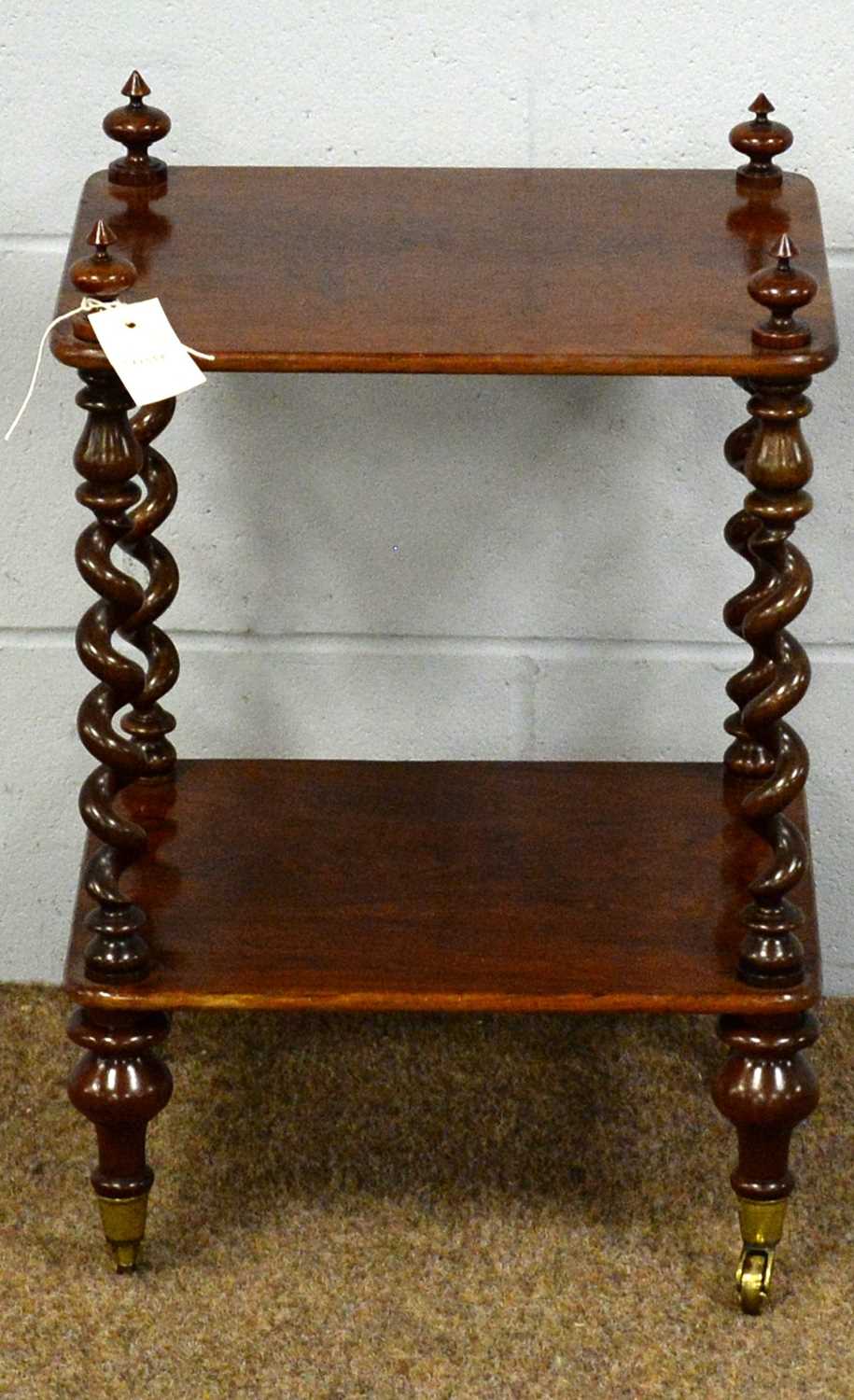 A small and attractive rosewood two-tier whatnot.