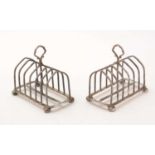 A pair of silver seven-bar toast racks, by Maxfield & Sons Ltd,