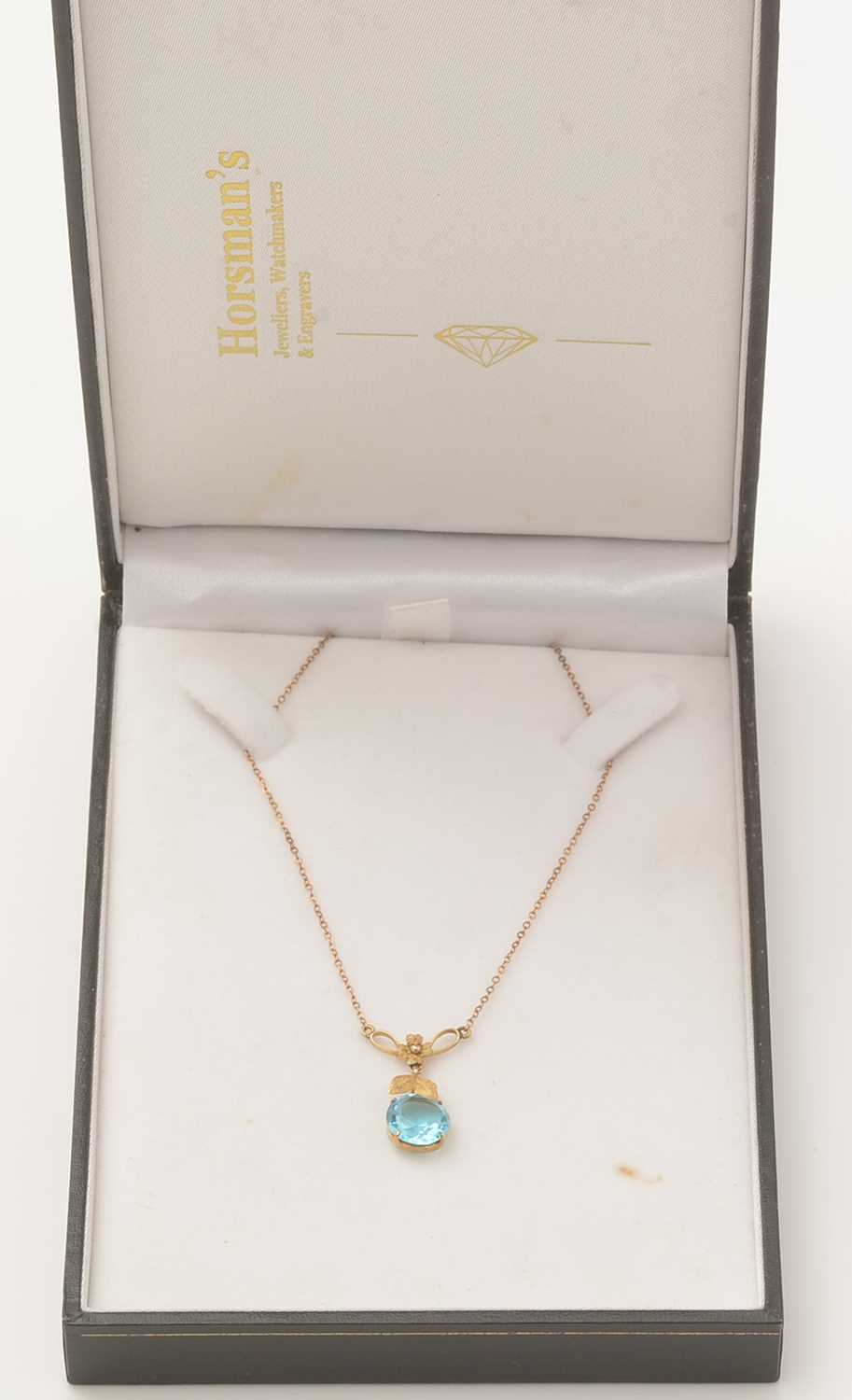 A blue glass and 9ct yellow gold pendant, - Image 3 of 3