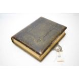 A Victorian leather-bound photograph albums.