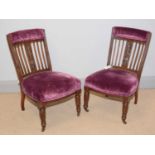 A pair of late Victorian nursing chairs.