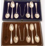 Two sets of silver teaspoons and tongs,