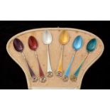 A cased set of six enamel silver teaspoons, by David Andersen,