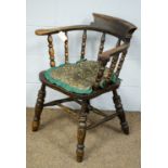 An early 20th Century oak and beechwood smokers bow chair