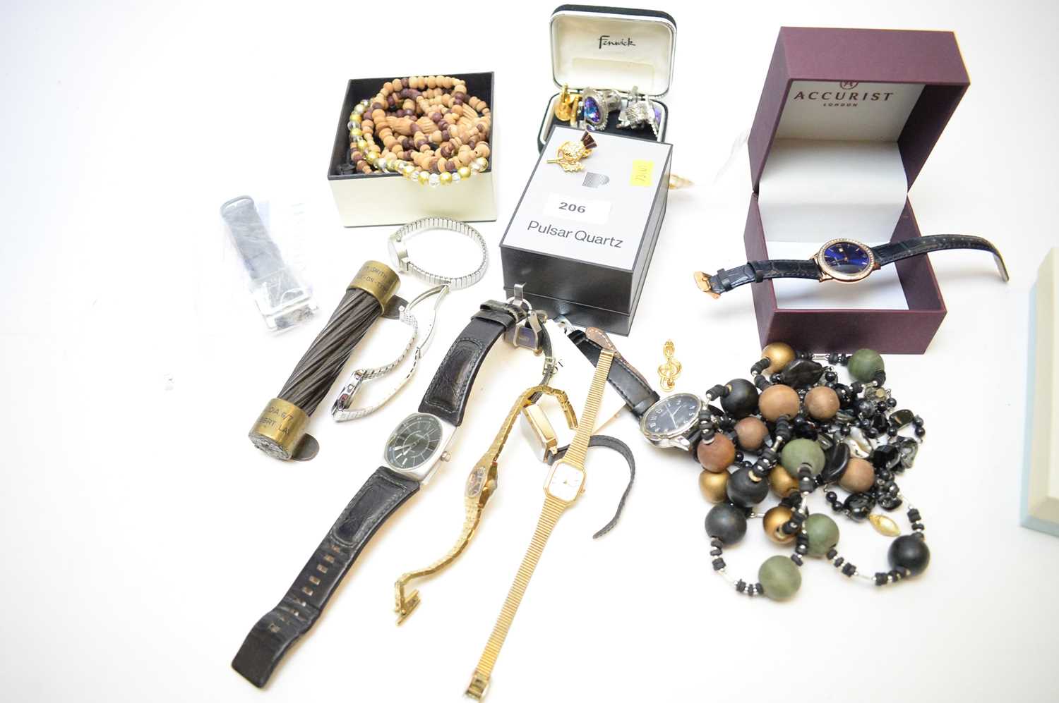 A selection of wrist watches and costume jewellery.