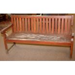 Firman Leisure: A substantial stained wood garden seat.