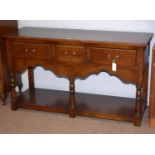 An 18th Century style ‘stressed oak’ dresser.