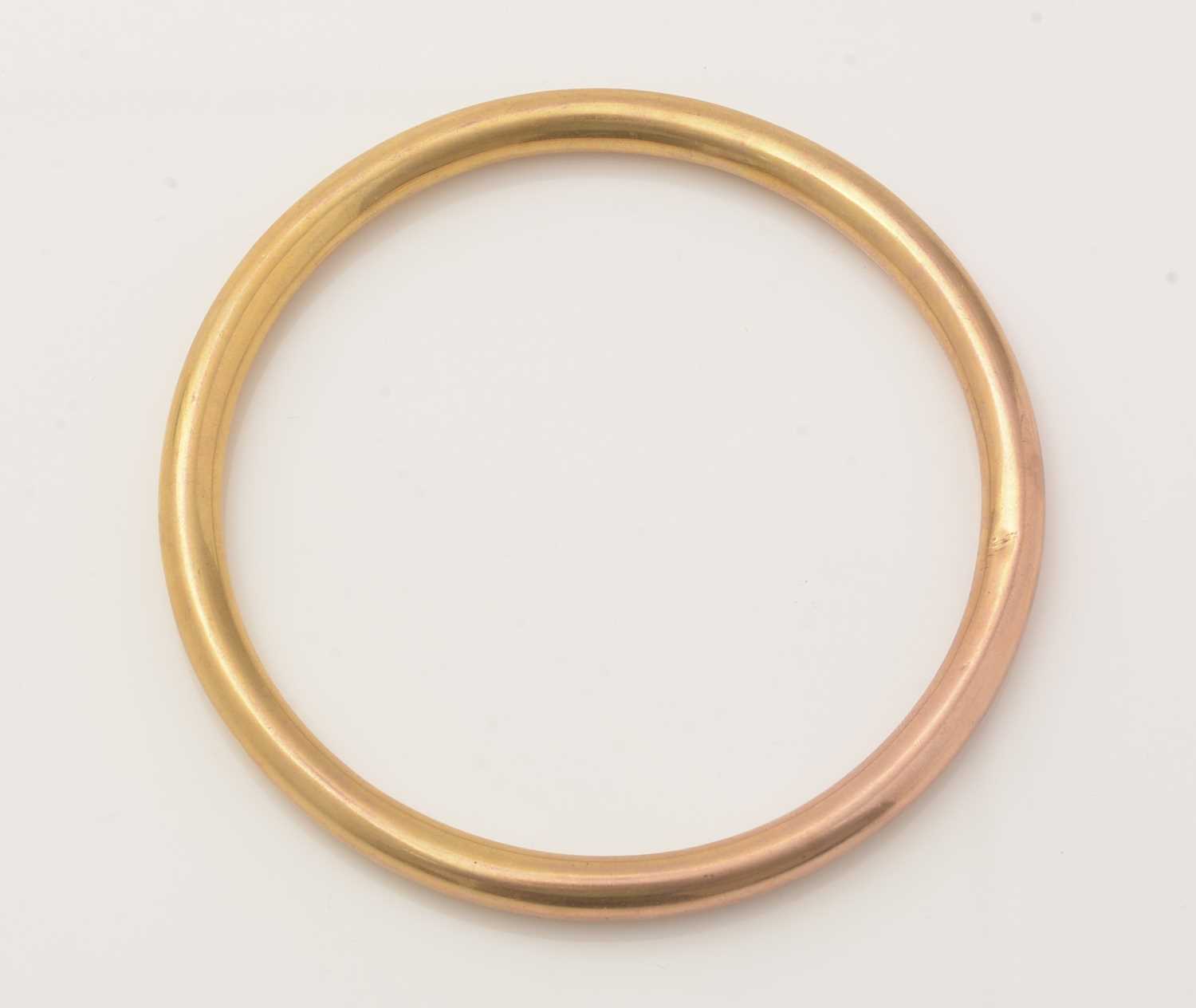 A 9ct yellow gold bangle, - Image 3 of 3