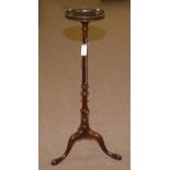 An attractive carved Georgian style mahogany jardiniere stand.