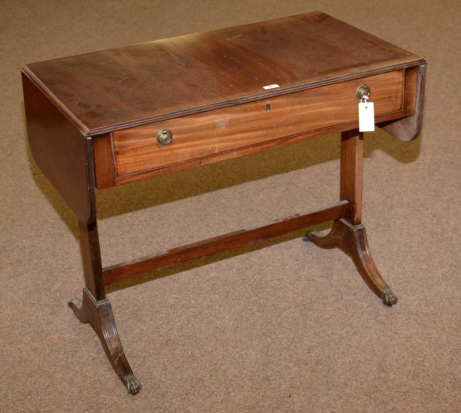 A Georgian-style mahogany sofa table.