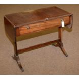 A Georgian-style mahogany sofa table.