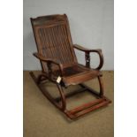 A Chinese hardwood rocking chair