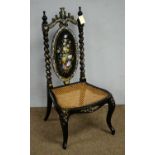 A decorative Victorian gilt papier-mâché salon chair
