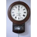 A late 19th Century stained wood wall timepiece