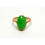 A jade cabochon ring,