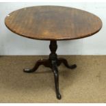 A George III mahogany tilt-action tripod table,