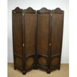 A Chinese hardwood and rattan panel four fold screen